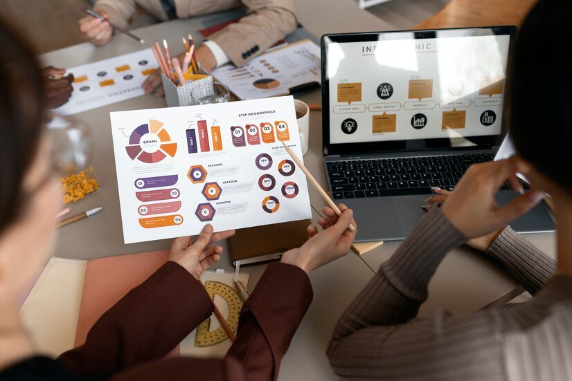 high-angle-people-working-with-laptop_23-2149636255 high-angle-people-working-with-laptop_23-2149636255